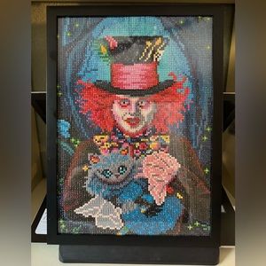 Completed diamond art mad hatter framed added glue sealant